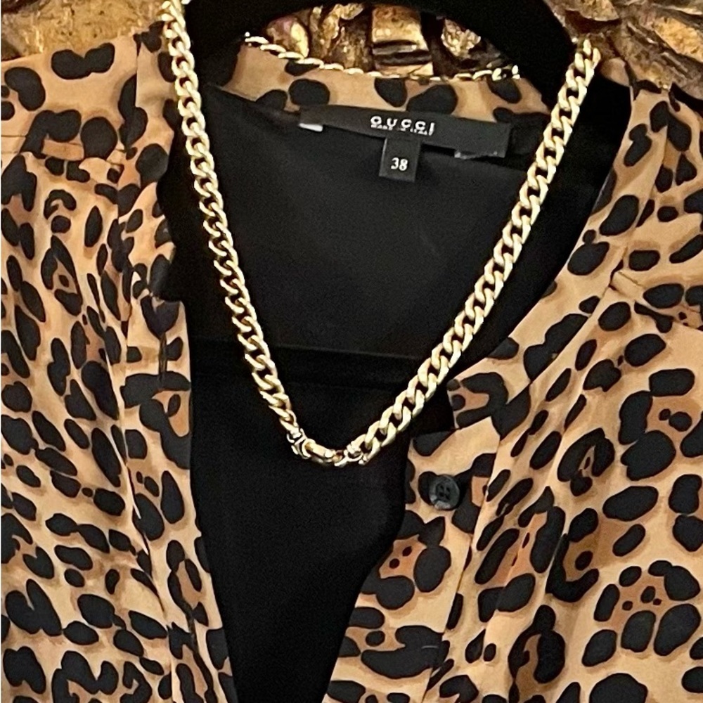 Gucci silk dress with the Gucci logo in the pattern!